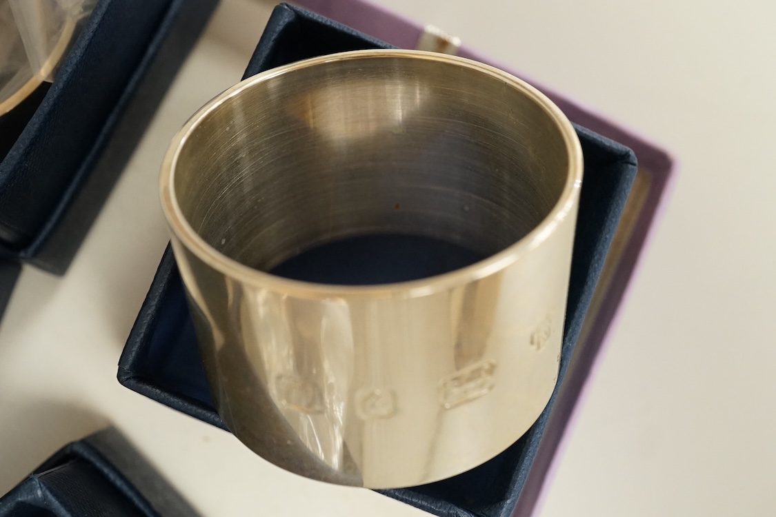 A set of six modern silver napkin rings by M C Hersey & Son Ltd, London, 1996, each individually boxed, 12.6oz.